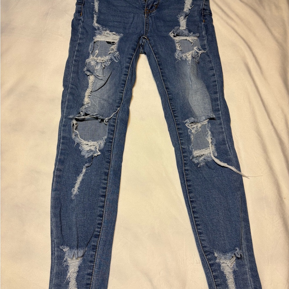 Trendy Distressed Skinny Jeans in Blue